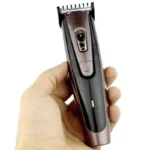 Kemei KM-9050 Hair Trimmer – Titanium Plated Blade, Low‑Noise Wireless Design, Adjustable Length – Silver - Image 2